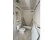 Bathroom in progress with toilet, tub, and fixtures at 4865 Surrey Dr, Roswell, GA 30075