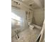 Bathroom in progress with toilet, tub, and fixtures at 4865 Surrey Dr, Roswell, GA 30075