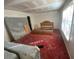Bedroom with red carpet, window, and bed frame at 4865 Surrey Dr, Roswell, GA 30075