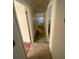 Hallway shows flooring work in progress at 4865 Surrey Dr, Roswell, GA 30075