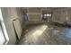 Unfinished living room area with exposed wall and floor offers customization at 4865 Surrey Dr, Roswell, GA 30075