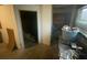 Interior storage area with shelving, window, and access to other rooms of the home at 4865 Surrey Dr, Roswell, GA 30075
