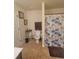 Bathroom featuring a toilet with a flower shower curtain and a brown rug on the tile flooring at 65 Waters Edge Ln, Covington, GA 30014