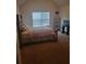Bedroom with carpet, vaulted ceilings, TV on stand and blinds on a window at 65 Waters Edge Ln, Covington, GA 30014
