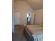 Bedroom with carpet, vaulted ceilings and a door to the left at 65 Waters Edge Ln, Covington, GA 30014
