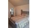 Bedroom with carpet, vaulted ceilings and bed with fancy bedspread at 65 Waters Edge Ln, Covington, GA 30014
