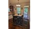 Eat-in kitchen breakfast nook with a four-seater table near a door with a view of the outside at 65 Waters Edge Ln, Covington, GA 30014