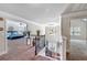 Hallway features a staircase and a bedroom, creating a warm and inviting transition at 65 Waters Edge Ln, Covington, GA 30014