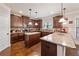 Spacious kitchen with granite countertops, stainless steel appliances, and hardwood floors at 65 Waters Edge Ln, Covington, GA 30014