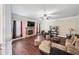 Inviting living room with hardwood floors, fireplace and plush seating at 65 Waters Edge Ln, Covington, GA 30014