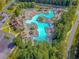 Community aerial view of swimming pool, parking, and landscaping surrounding the space at 111 Springshade Ln, Canton, GA 30114