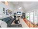 Open-concept living room with vaulted ceiling, fireplace, and sliding doors to the exterior at 111 Springshade Ln, Canton, GA 30114