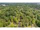 Scenic aerial view showcasing the home nestled among lush greenery and trees at 2148 Meador Se Ave, Atlanta, GA 30315