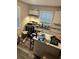 This kitchen has white cabinets, a window, and an island at 2148 Meador Se Ave, Atlanta, GA 30315