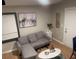 Inviting living room with a gray couch, decorative coffee table, and natural light at 2148 Meador Se Ave, Atlanta, GA 30315