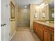 Bathroom featuring a glass-enclosed shower, double vanity, and granite counters at 3171 Davis Rd, Marietta, GA 30062