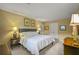 Bright bedroom features a comfortable bed, neutral tones, and classic decor at 3171 Davis Rd, Marietta, GA 30062