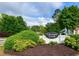 Chestnut Creek neighborhood sign with lush landscaping and a clear blue sky as a backdrop at 3171 Davis Rd, Marietta, GA 30062