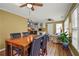 Open concept dining area with hardwood floors flowing into the kitchen and living room at 3171 Davis Rd, Marietta, GA 30062