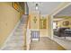 Inviting entryway with a staircase leading upstairs and hardwood-style flooring at 3171 Davis Rd, Marietta, GA 30062