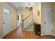 Welcoming foyer features hardwood floors and a staircase, creating a grand entrance at 3171 Davis Rd, Marietta, GA 30062