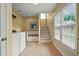Convenient laundry room and staircase with ample storage and natural light at 3171 Davis Rd, Marietta, GA 30062