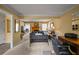 Spacious open-concept area with living room and office, neutral walls, and carpeting at 3171 Davis Rd, Marietta, GA 30062