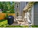 Concrete patio with table, chairs, and grill, located just outside of the home at 3171 Davis Rd, Marietta, GA 30062