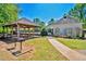 Community pavilion offers a shaded area for outdoor gatherings, with grills and picnic tables at 3171 Davis Rd, Marietta, GA 30062