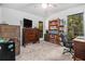 Bedroom with views of the green outdoors and built in shelves at 318 Tuxworth Cir, Decatur, GA 30033