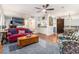 Cozy living room with hardwood floors, area rug, fireplace, and open dining area at 318 Tuxworth Cir, Decatur, GA 30033