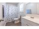 Bathroom featuring vanity, mirror, toilet and shower with modern fixtures at 429 Orchard Dr, Stone Mountain, GA 30083
