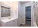 Bright bathroom with shower, vanity, and updated fixtures at 429 Orchard Dr, Stone Mountain, GA 30083
