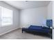 Bedroom with window, hardwood floors, and neutral walls at 429 Orchard Dr, Stone Mountain, GA 30083