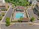 Aerial view of a community pool with ample seating and covered areas at 964 Catamaran Ct, Alpharetta, GA 30005