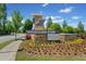 Community entrance sign reads 'Windward Park' surrounded by vibrant landscaping at 964 Catamaran Ct, Alpharetta, GA 30005