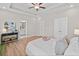 Elegant main bedroom with a view of the ensuite bathroom and closet at 964 Catamaran Ct, Alpharetta, GA 30005