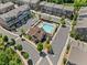 Aerial view of a sparkling community pool surrounded by lounge chairs and manicured landscaping at 964 Catamaran Ct, Alpharetta, GA 30005