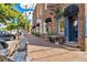 Charming street view showcasing brick buildings, quaint shops, and inviting outdoor seating at 964 Catamaran Ct, Alpharetta, GA 30005