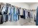 Walk-in closet with extensive hanging storage for clothing and hat storage at 2005 Haley Walk, Woodstock, GA 30188