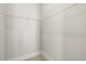 Empty walk-in closet with simple wire shelving, ready to be organized and filled at 2005 Haley Walk, Woodstock, GA 30188