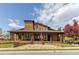 The clubhouse has a large porch, patio, and an American flag at 2005 Haley Walk, Woodstock, GA 30188