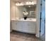 Elegant bathroom boasting dual sinks, pristine countertops, and modern fixtures at 216 Eping Dr, Stockbridge, GA 30281