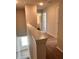 Bright hallway with neutral tones, leading to bedrooms and bathrooms at 216 Eping Dr, Stockbridge, GA 30281