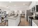 Modern kitchen with stainless steel appliances, granite countertops, and an open layout at 216 Eping Dr, Stockbridge, GA 30281