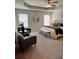 This main bedroom features neutral walls, carpeted floor, ceiling fan, and two sun-filled windows at 216 Eping Dr, Stockbridge, GA 30281