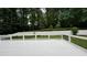 This landscaped backyard with privacy fence is perfect for outdoor entertaining and relaxation at 313 Summit Ridge Dr, Lawrenceville, GA 30046