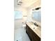 Bathroom with marble countertops and updated fixtures at 313 Summit Ridge Dr, Lawrenceville, GA 30046