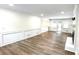Inviting living room featuring hardwood floors, white trim, and fireplace at 313 Summit Ridge Dr, Lawrenceville, GA 30046