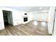 Comfortable living room featuring hardwood floors, fireplace, and white trim at 313 Summit Ridge Dr, Lawrenceville, GA 30046